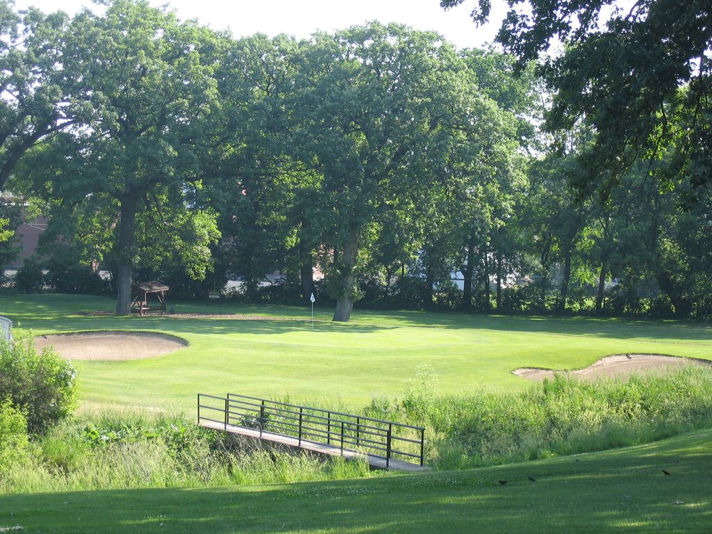 Golf course green with bridges